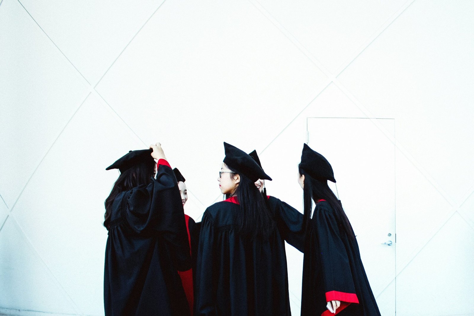 people in academic dress standing